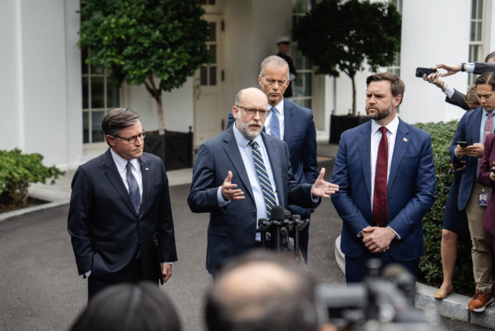 Office of Management and Budget Director Russel Vought (C)—joined by Vice President JD Vance (R), House Speaker Mike Johnson (R-La.) (L), and Senate Majority Leader John Thune (R-S.D.) (3rd L)—speaks at the White House on Sept. 29, 2025. Photo by Madalina Kilroy.