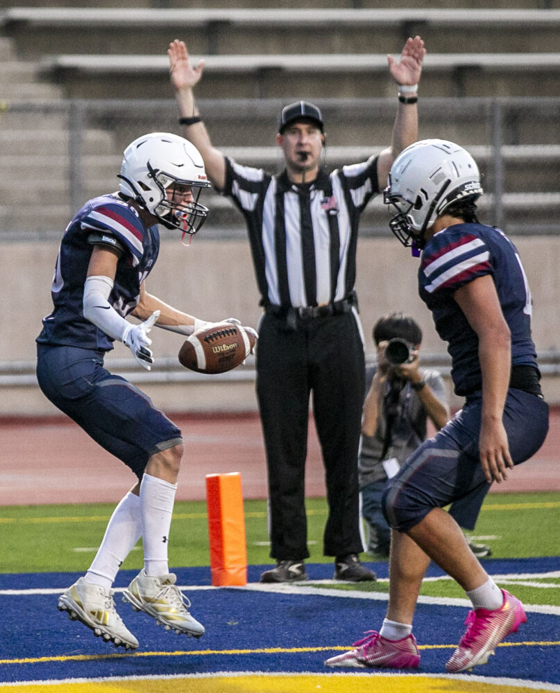 Trinity wide receiver Chase Backman (35) celebrates with teammates during the second quarter of Saturday's game against San Fernando at College of the Canyons on Aug. 23, 2025. Habeba Mostafa/ The Signal