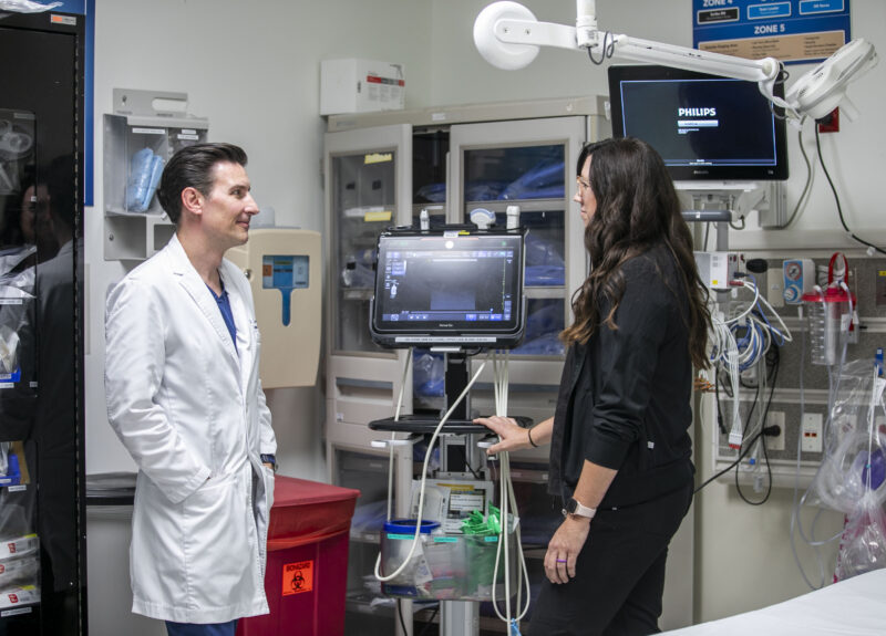 Dr. Jack Casey and Emma Jerrain stand in an emergency operating room at Henry Mayo Newhall Hospital on Wednesday, Aug. 20, 2025. Habeba Mostafa/ The Signal