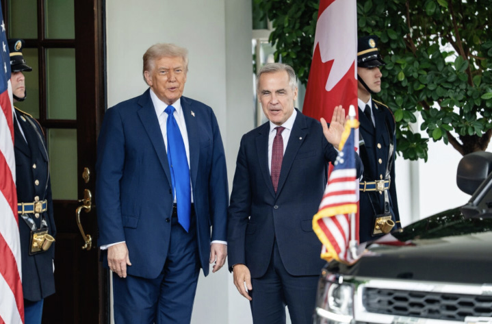 U.S. President Donald Trump greets Canadian Prime Minister Mark Carney at the White House in Washington on Oct. 7, 2025. Photo by Madalina Kilroy.