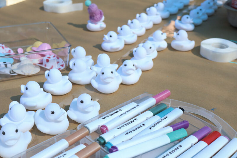 Attendees could color some white ducks as an activity at the 23rd annual Duck Dash at the Santa Clarita Aquatic Center, Sunday, Oct. 5, 2025. Kamryn Martell/The Signal