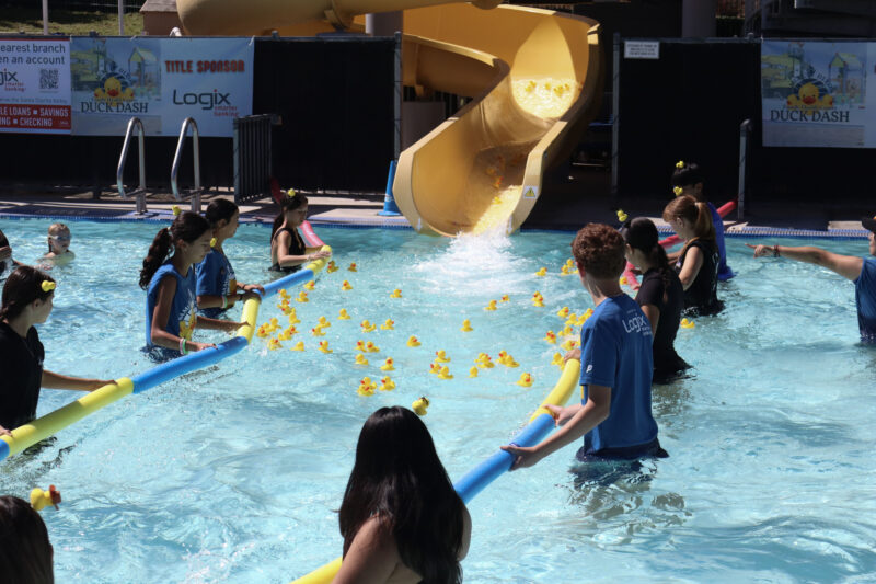 The load of ducks go down the slide into the pool at the 23rd annual Duck Dash at the Santa Clarita Aquatic Center, Sunday, Oct. 5, 2025. Kamryn Martell/The Signal