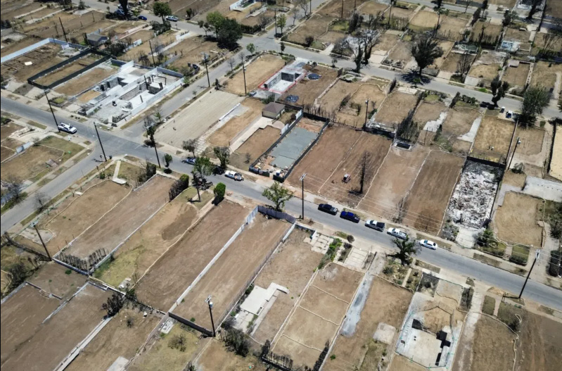 The property lines of homes burned during the Palisades Fire still sit visible in the Pacific Palisades neighborhood of Los Angeles on June 9, 2025. Photo by John Fredricks.