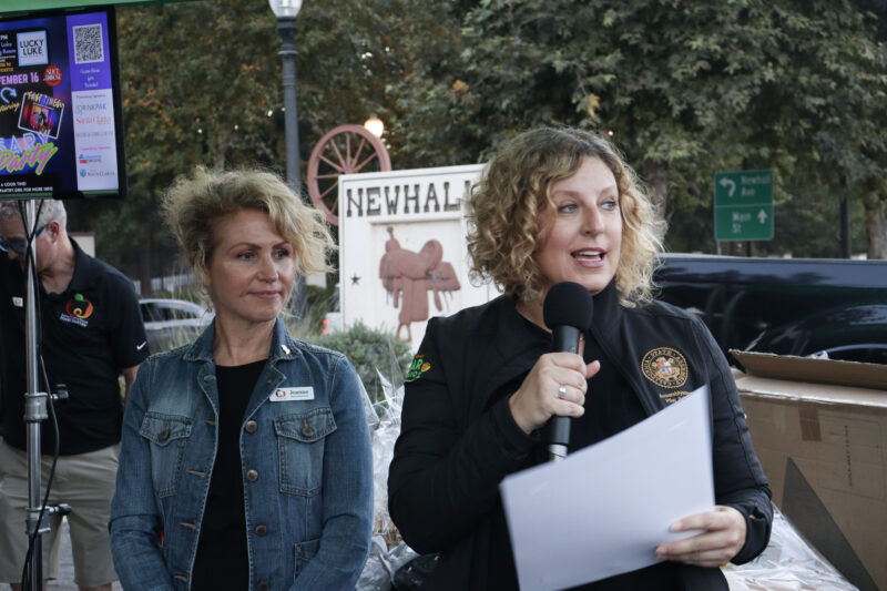 Assemblywoman Pilar Schiavo (R) gives the Santa Clarita Valley Food Pantry a recognition certificate at the Valley Industry Association mixer for the SCV Food Pantry's 40th anniversary at the SCV Food Pantry in Newhall, Calif., Thursday, Oct. 2, 2025. Kamryn Martell/The Signal