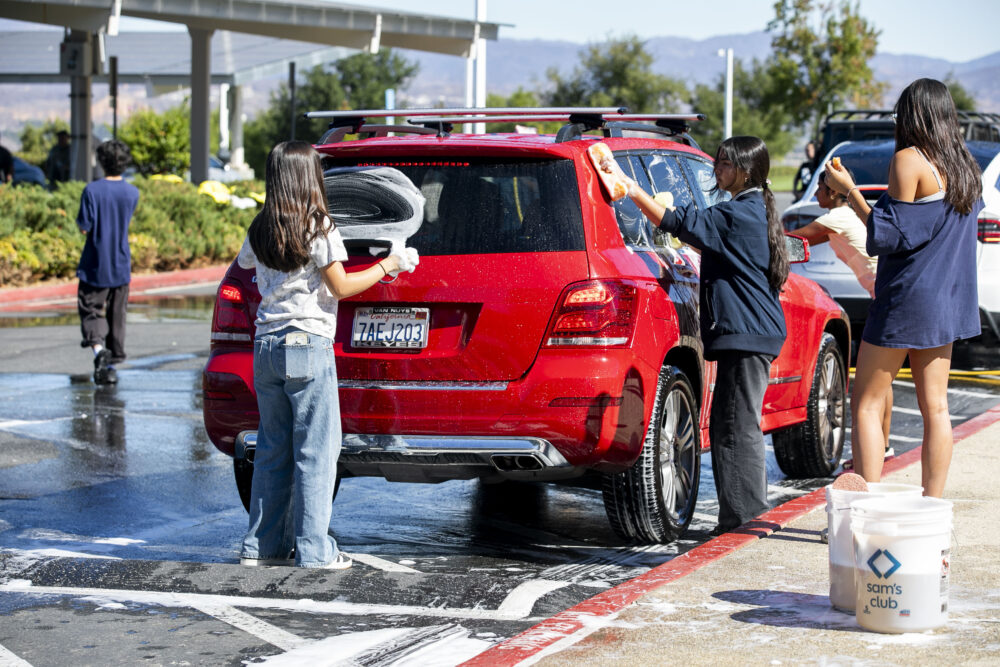 Students from the West Ranch High School marching band took part in the annual "Wet Ranch" car wash at Rancho Pico Junior High School on Saturday, Oct. 4, 2025. Habeba Mostafa/ The Signal