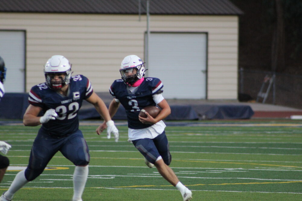 Trinity running back Aiden Visconti running down the field during the game at Cougar Stadium on Oct. 11, 2025. Ryan Romero/The Signal