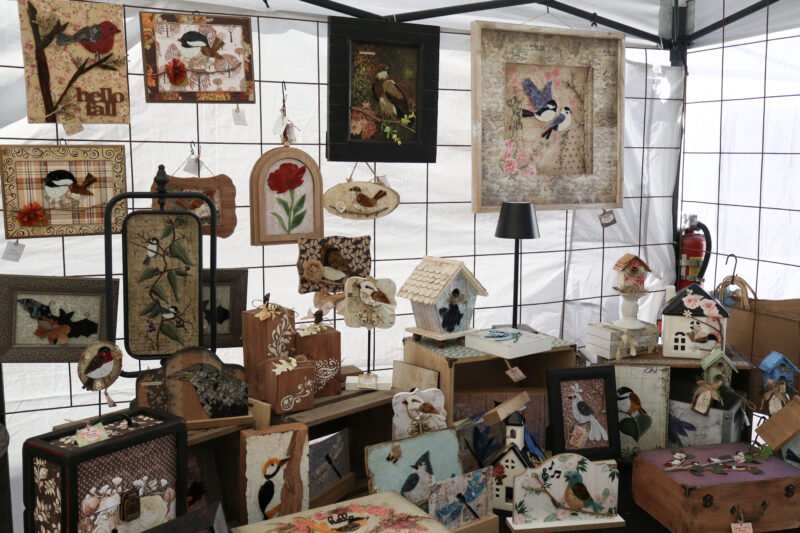 Featured artist Carolyn McLintock's stained glass mixed media art sits on display at the Old Town Newhall Fine Art Festival on Main Street in Newhall, Calif., Sunday, Oct. 12, 2025. Kamryn Martell/The Signal