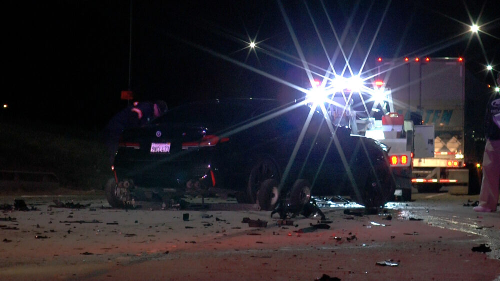 California Highway Patrol officers were called to the scene of a crash between a BMW and a big rig in the early hours of Saturday morning, Oct. 18, 2025, on State Route 14 in the Newhall Pass. Signal staff photo.