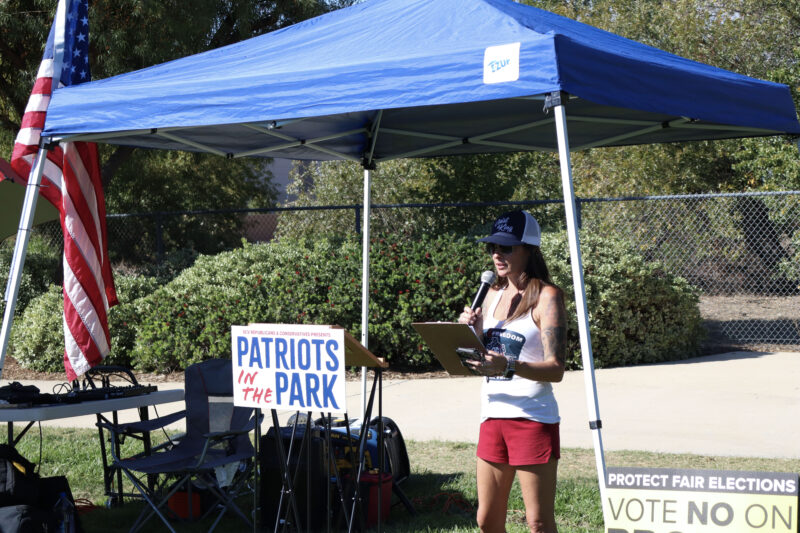 Breanne DeMack speaks to the audience at the "Patriots in the Park" event at Circle J Ranch Park, Sunday, Oct. 19, 2025. Kamryn Martell/The Signal