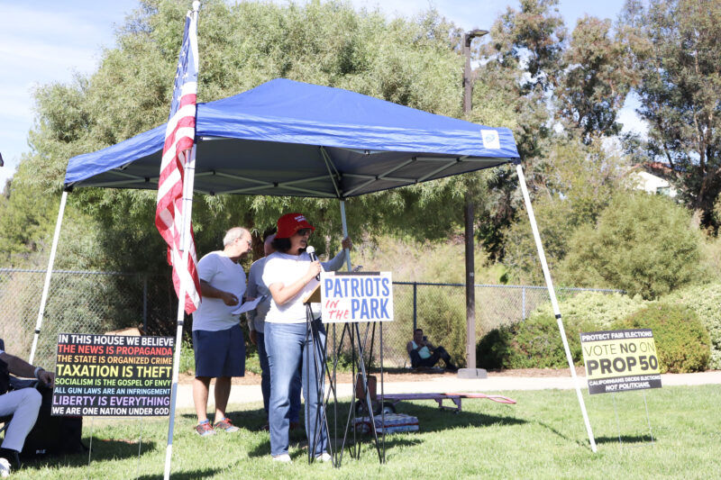 Harleen Grewal, dentist and owner of Skyline Smiles, speaks to attendees at the "Patriots in the Park" event at Circle J Ranch Park, Sunday, Oct. 19, 2025. Kamryn Martell/The Signal