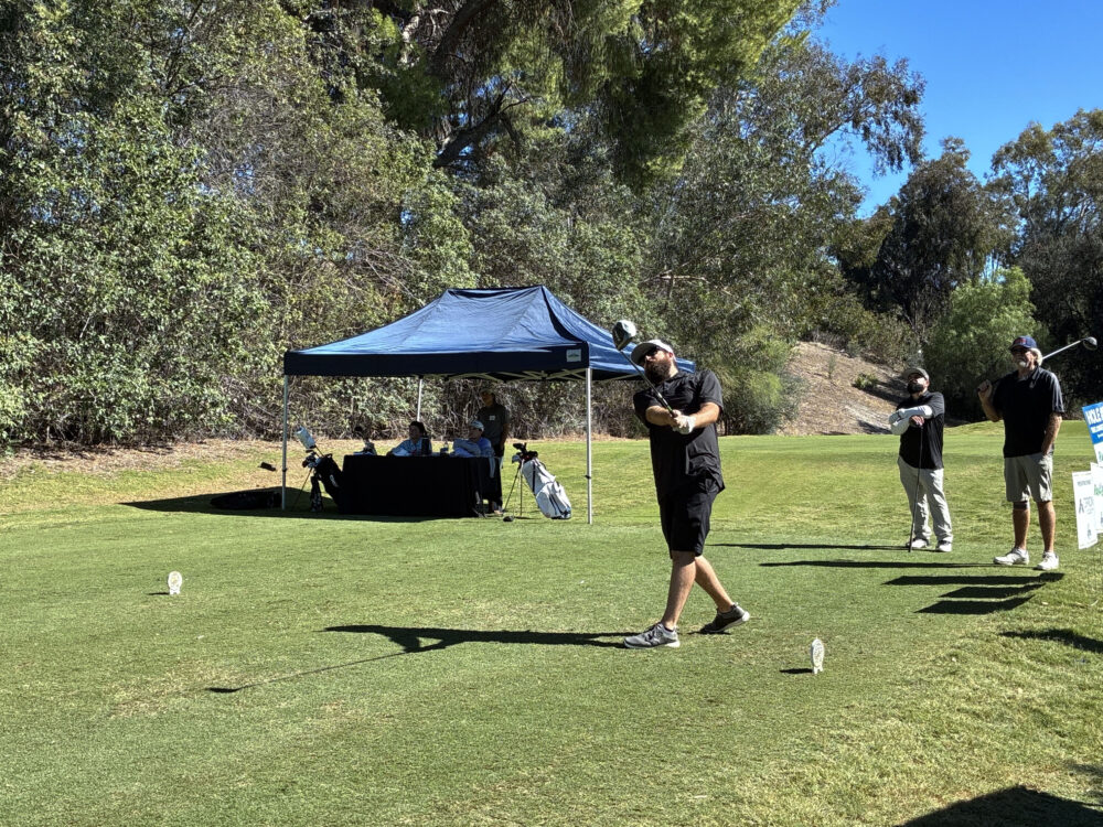 Justin Meyer hits the golf ball at the College of the Canyons' "Swing for Students' Success" annual golf tournament at Valencia Country Club in Valencia, Calif., Monday, Oct. 20, 2025. Kamryn Martell/The Signal