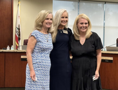 Fostering Youth Independence co-founders Carolyn Olsen and Gina Stevens recently received the One Hart award from board member Erin McKeon Wilson of the William S. Hart Union High School District. Courtesy photo.