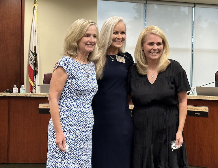 Fostering Youth Independence co-founders Carolyn Olsen and Gina Stevens recently received the One Hart award from board member Erin McKeon Wilson of the William S. Hart Union High School District. Courtesy photo.