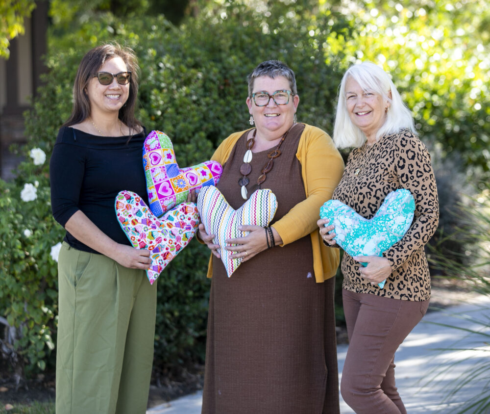 ‘Solidarity Sewing Workshop’ creates hundreds of mastectomy pillows 