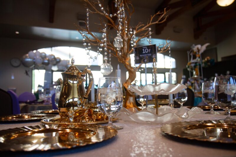 The Circle of Hope Annual Tea honors those lost to cancer through a memorial table on Oct. 18, 2025. Katherine Quezada/The Signal