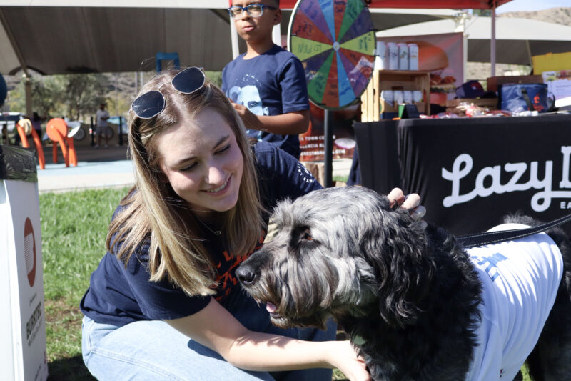 Molly Avanessian pets Kibbles, 3, at the American Cancer Society's Bark For Life "Howl-O-Ween" event at the Canyon Country Community Center in Canyon Country, Calif., Sunday, Oct. 26, 2025. Kamryn Martell/The Signal