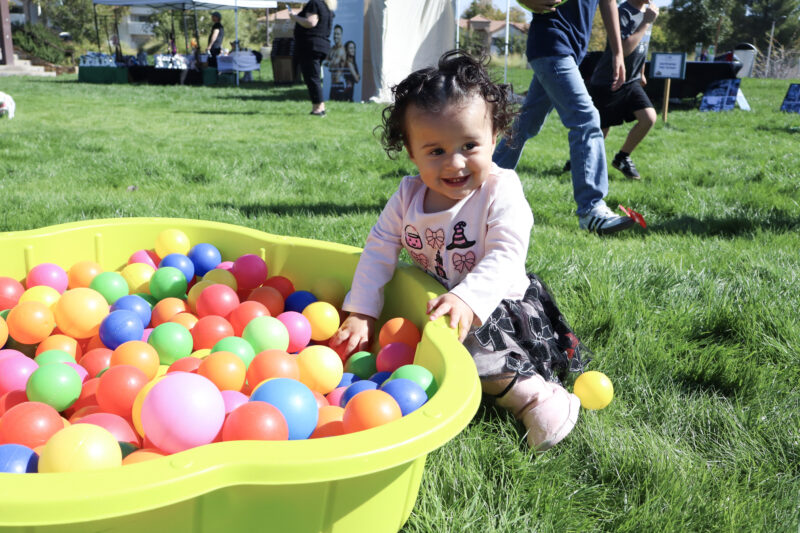Valeria Vives, 1, plays in the ball pit at the American Cancer Society's Bark For Life "Howl-O-Ween" event at the Canyon Country Community Center in Canyon Country, Calif., Sunday, Oct. 26, 2025. Kamryn Martell/The Signal