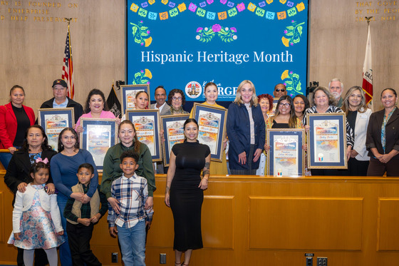 Supervisor Kathryn Barger poses with honorees during a Board of Supervisors meeting. Photo by David Franco/Los Angeles County.