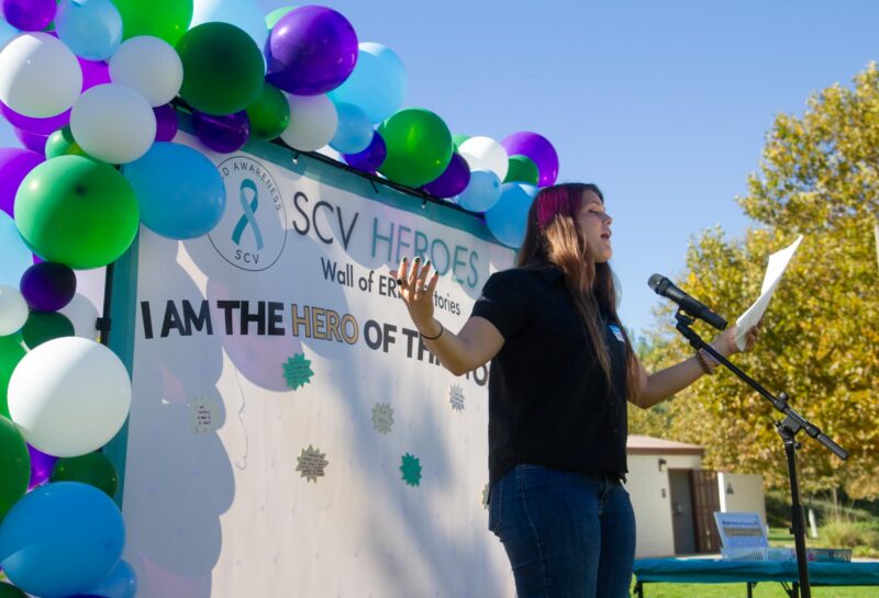Stephanie Garris shares her story living with OCD to the attendees of the annual OCD Walk hosted by the OCD Awareness SCV group at Fair Oaks Part on Oct. 18, 2025. Katherine Quezada/The Signal