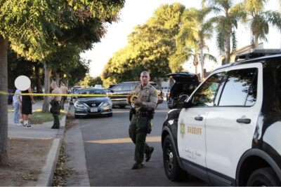 Santa Clarita Valley sheriff’s deputies investigate reports of shots being fired near the intersection of Walnut Street and 15th Street in Newhall on Wednesday, with the incident also involving a vehicle collision. Signal Staff photo.