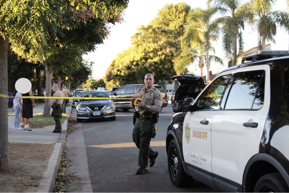 Santa Clarita Valley sheriff’s deputies investigate reports of shots being fired near the intersection of Walnut Street and 15th Street in Newhall on Wednesday, with the incident also involving a vehicle collision. Signal Staff photo.