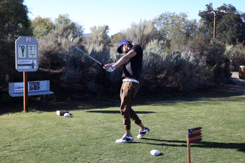Dustin Helvig hits the golf ball at the 12th annual Thank-A-Veteran golf tournament at the Sand Canyon Country Club in Canyon Country, Calif., Monday, Oct. 27, 2025. Kamryn Martell/The Signal