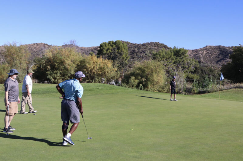 Attendees play on the putting green at the 12th annual Thank-A-Veteran golf tournament at the Sand Canyon Country Club in Canyon Country, Calif., Monday, Oct. 27, 2025. Kamryn Martell/The Signal