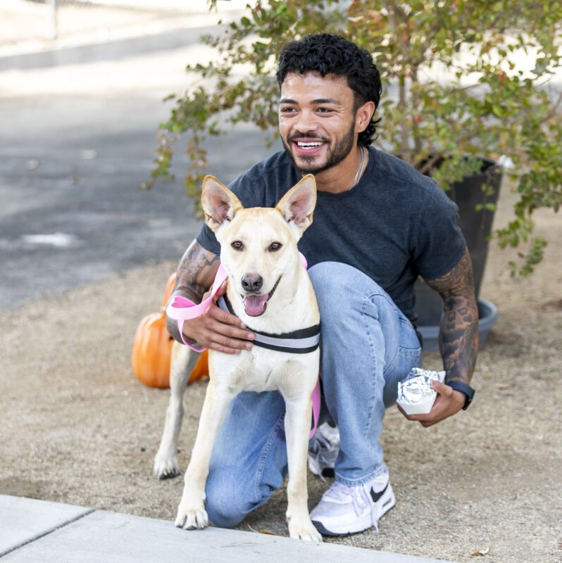 Briann Eddy adopted Weems during the Trunk-or-Treat Animal Adoption Event at the Castaic Animal Care Center on Saturday, Oct. 25, 2025. Habeba Mostafa/ The Signal