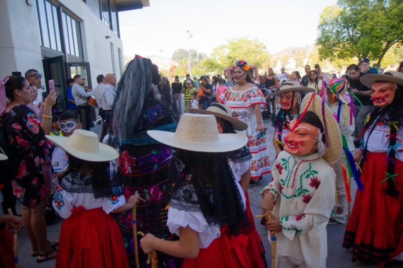 Children head inside the Canyon Country Community Center to deliver a Folklorico performance for the Dia De Muertos celebration in Canyon Country on Oct. 25, 2025. Katherine Quezada/The Signal