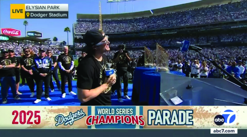Kiké Hernández of the L.A. Dodgers speaks during the celebration of the Dodgers' dramatic World Series win in seven games over the Toronto Blue Jays. Screenshot courtesy of ABC7.