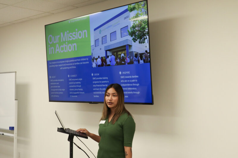 Nayeli Huijara, program and services coordinator at Single Mothers Outreach, gives a presentation at the SMO  "Adopt-A-Family" kickoff celebration at the SMO offices in Valencia, Thursday, Oct. 30, 2025. Kamryn Martell/The Signal