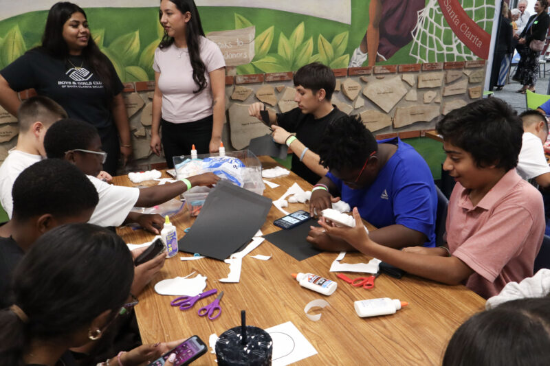 Attendees do some crafts at the renovations ribbon cutting ceremony at the Boys and Girls Club of Santa Clarita Valley Thomas E. Dierckman Clubhouse in Canyon Country, Calif., Wednesday, Oct. 29, 2025. Kamryn Martell/The Signal