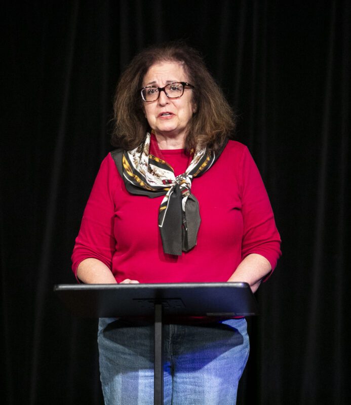 Poet Cheryl Thatt-Burbank reads aloud her poem during the 2025 Sidewalk Poetry Dedication at The Main in Old Town Newhall on Thursday, Oct. 30, 2025. Habeba Mostafa/ The Signal