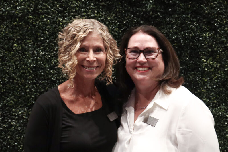 Amy Daniels (L) and Christy Alben (R) smile for a photo at the WiSH Foundation's "Wine Under the Roof" event at the Santa Clarita Valley Senior Center at Bella Vida in Canyon Country, Calif., Thursday, Nov. 6, 2025. Kamryn Martell/The Signal