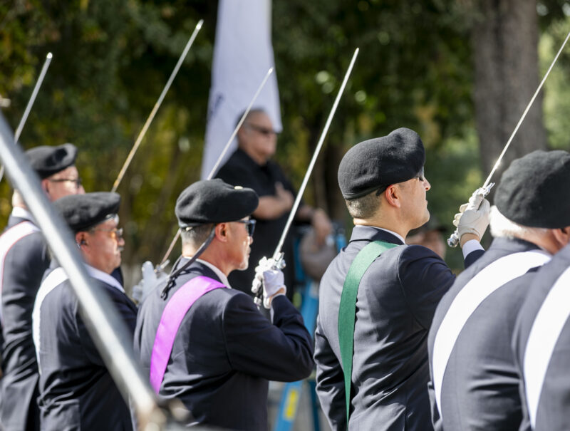 Knights of Columbus Santa Clarita Assembly, Vietnam Veterans of America, Chapter 355, and Santa Clarita Valley Young Marines change the flags during the 19th annual Santa Clarita Veterans Day Ceremony at Veterans Historical Plaza on Tuesday, Nov. 11, 2025. Habeba Mostafa/ The Signal