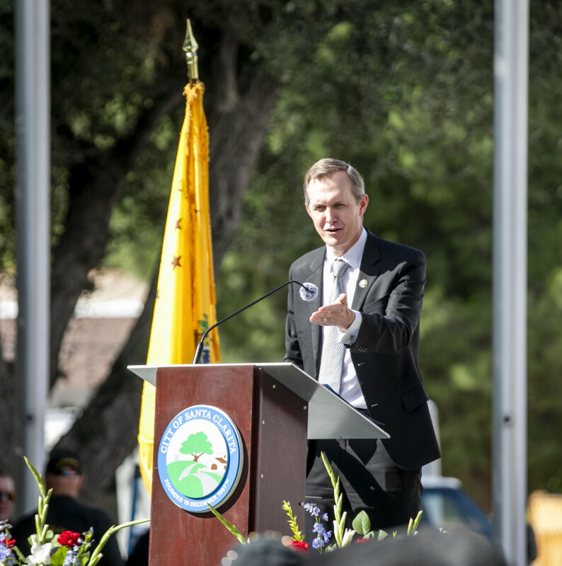 United States Congressman George Whitesides, D-Agua Dulce, takes the podium during the 19th annual Santa Clarita Veterans Day Ceremony at Veterans Historical Plaza on Tuesday, Nov. 11, 2025. Habeba Mostafa/ The Signal