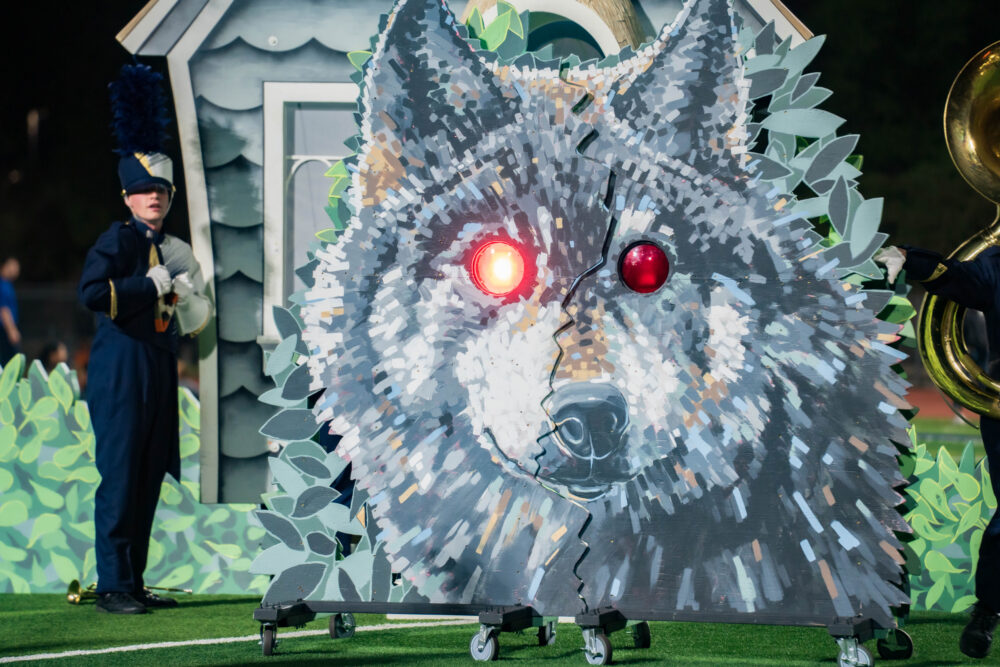 West Ranch High School band dads Jim Forrest and Jonathan Gallaway have volunteered their time and energy to create and maintain the props for “Red,” the band’s field show that loosely tells the story of Little Red Riding Hood. Photo courtesy of Manuel Villa and Ruthy Horak.