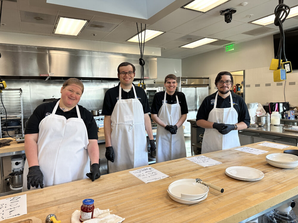Participants in Carousel Ranch's Ready to Work program prepare vegetables as part of the program's "restaurant experience week." Photo courtesy of Carousel Ranch.