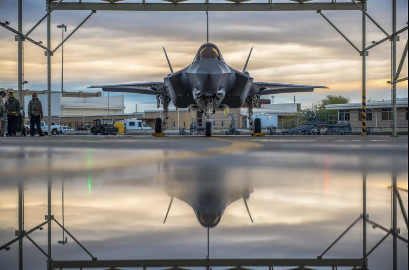 A pilot assigned to the 61st Fighter Squadron and 61st Aircraft Maintenance Unit crew chiefs prepare an F-35A Lightning II for taxi at Luke Air Force Base, Ariz., on Jan. 15, 2019. Airman 1st Class Jacob Wongwai/U.S Air Force