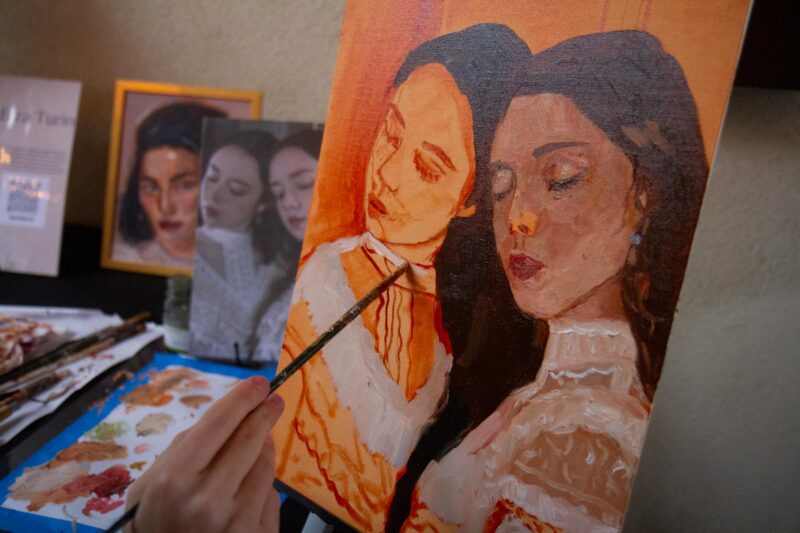 Artist and SCAA member Ezra Turn live paints during The Santa Clarita Artists Association Gallery’s group art schow titled “Reflections” in Newhall on Saturday, Nov. 15, 2025. Katherine Quezada/The Signal