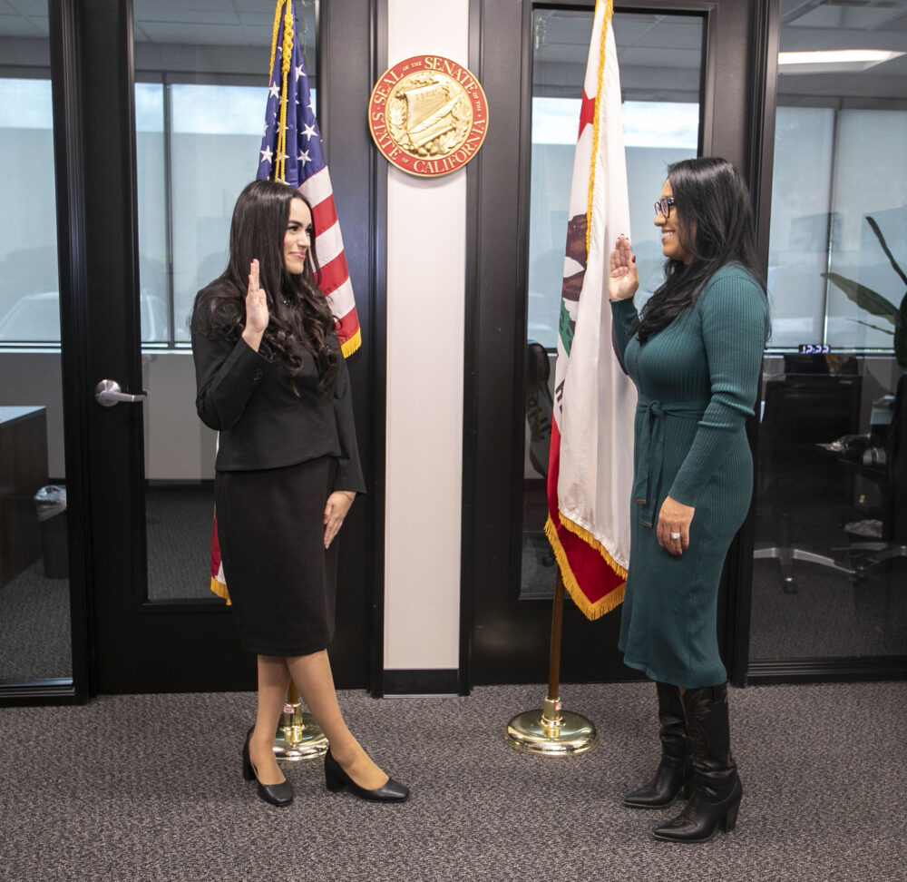 Angelina Rego, left, is sworn in as a lawyer by Sen. Suzette Martinez Valladares, R-Acton, in Valladares' office in Valencia on Friday, Nov. 21, 2025. Habeba Mostafa/ The Signal