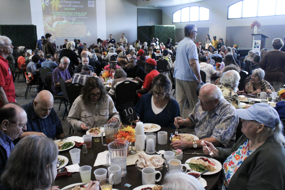 Attendees eat their meals at the Santa Clarita Valley Senior Center and SCV/Castaic Lions Club Thanksgiving feast at the SCV Senior Center at Bella Vida in Canyon Country, Calif., Thursday, Nov. 27, 2025. Kamryn Martell/The Signal