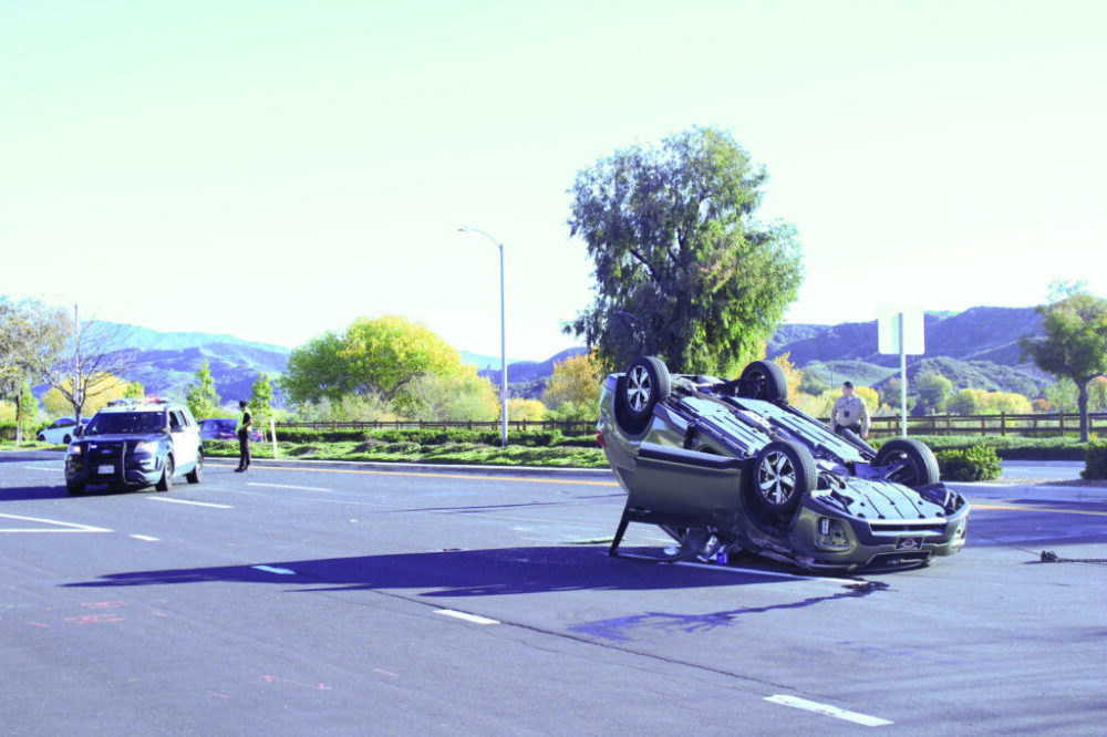 Sheriff's Office personnel respond to a crash on Newhall Ranch Road that resulted in one rollover Friday afternoon, Nov. 28, 2025. Susan Monaghan/The Signal