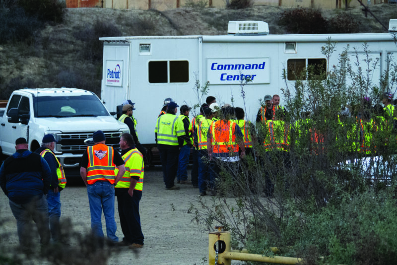Men at the site of an oil spill cleanup next to the Santa Clara River near Val Verde on Friday, Dec. 5, 2025. Katherine Quezada/The Signal