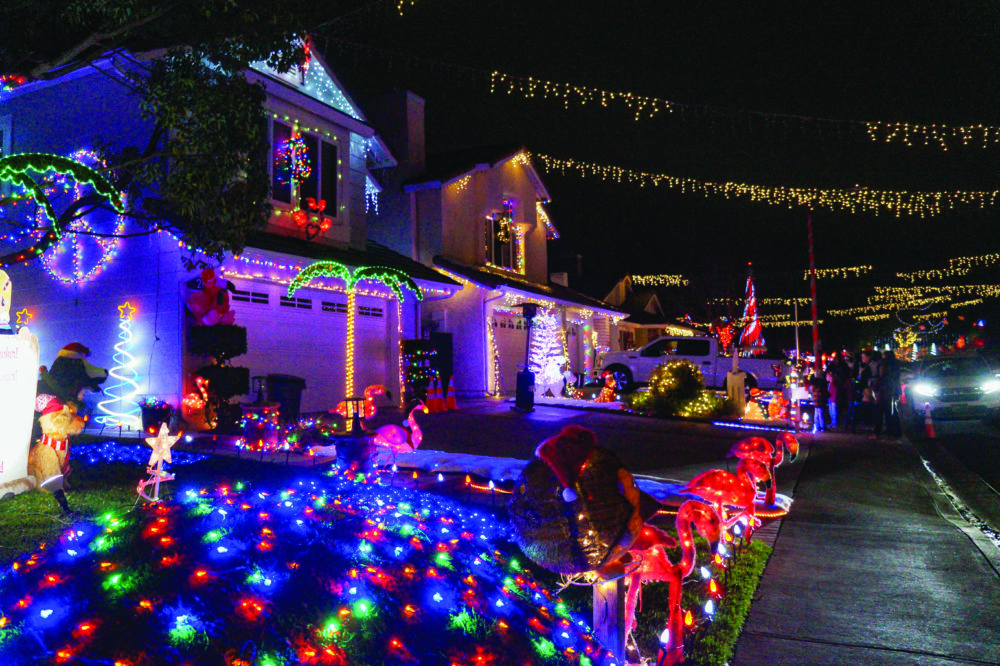 Every house in Wakefield Winter Wonderland, a small neighborhood street in Saugus, is fully decked out in holiday lights and welcomes visitors from all over to catch a glimpse of the decorations. PHOTO BY Katherine Quezada / The Signal