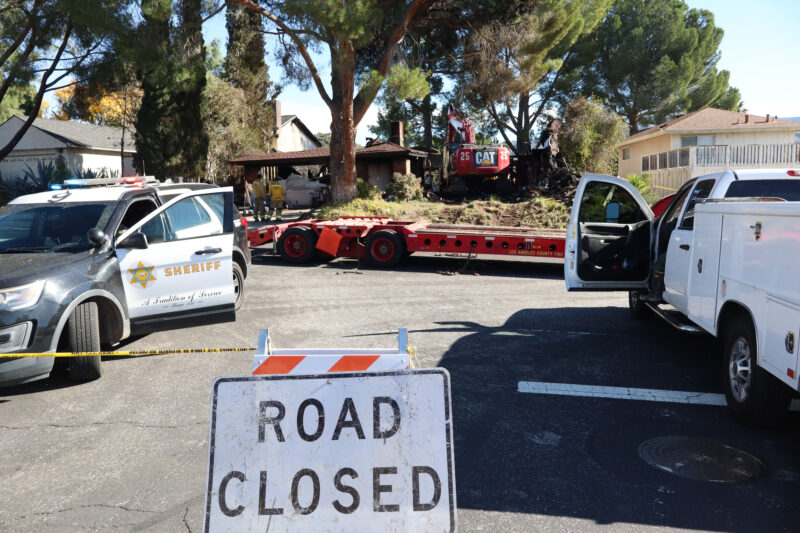 Road closures are in place after a structure fire on Saturday at the 29100 block of Flowerpark Drive in Canyon Country, Calif., Sunday, Dec. 14, 2025. Kamryn Martell/The Signal