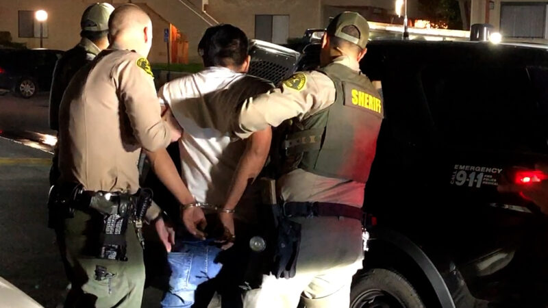 A man gets detained after an altercation with a child on Via Canon and Silverado in Newhall, Calif., on Sunday evening, Monday, Dec. 15, 2025. Signal Staff/The Signal
