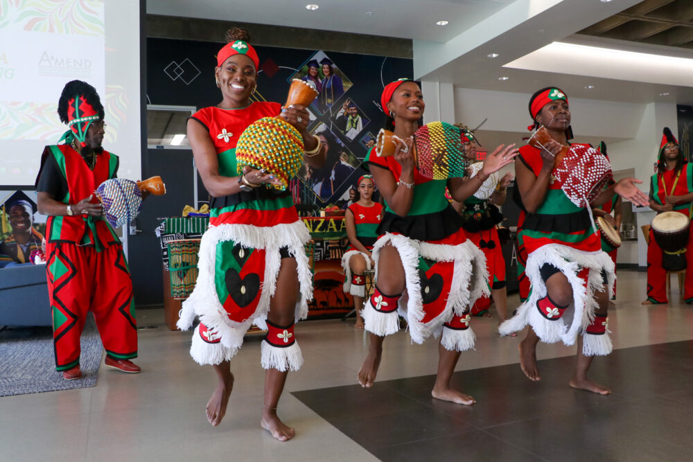The College of the Canyons Intercultural Center and Umoja Community hosted a Kwanzaa celebration on Wednesday, Dec. 3. The free event, which drew more than 100 attendees, featured a performance by the Teye Sa Thiosanne African Drum and Dance Company, as well as a kinara display. Photo by Stephanie Corral/COC Public Information Office.