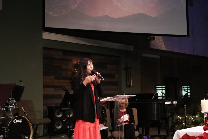 Alison Lewis sings a song at the Santa Clarita Valley Chapter of Compassionate Friends 24th annual Candlelight Remembrance Program at BethlehemSCV in Canyon Country, Calif., Sunday, Dec. 14, 2025. Kamryn Martell/The Signal