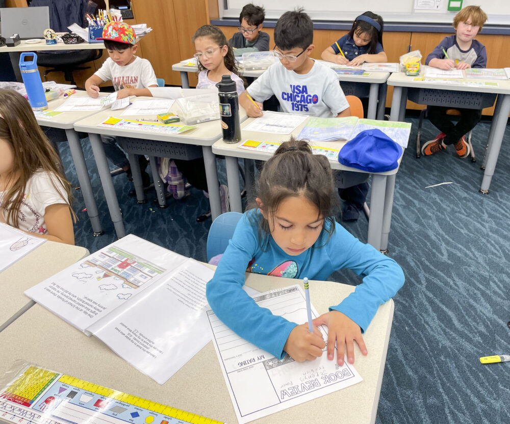 Katherine Solomon's second grade students at Emblem Academy wrote a book review on the books they received from Caroline Regan's seventh grade class at Rio Norte Junior High School. Courtesy of Katherine Solomon.